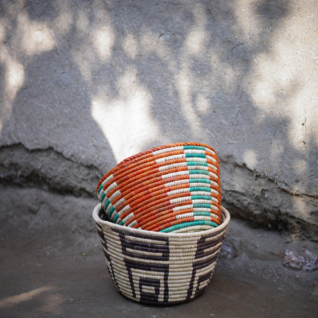 Plant Basket woven in a tribal pattern with boho tones